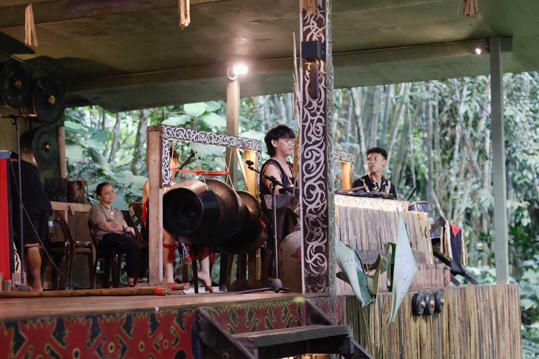 man singing on village stage
