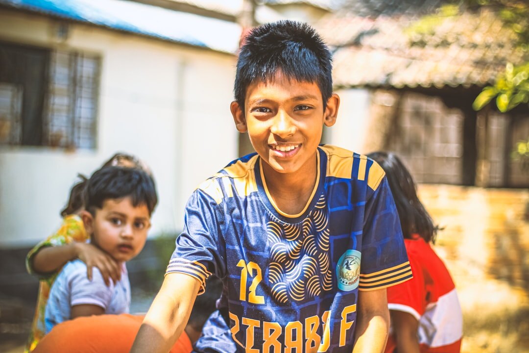 young footballer in village